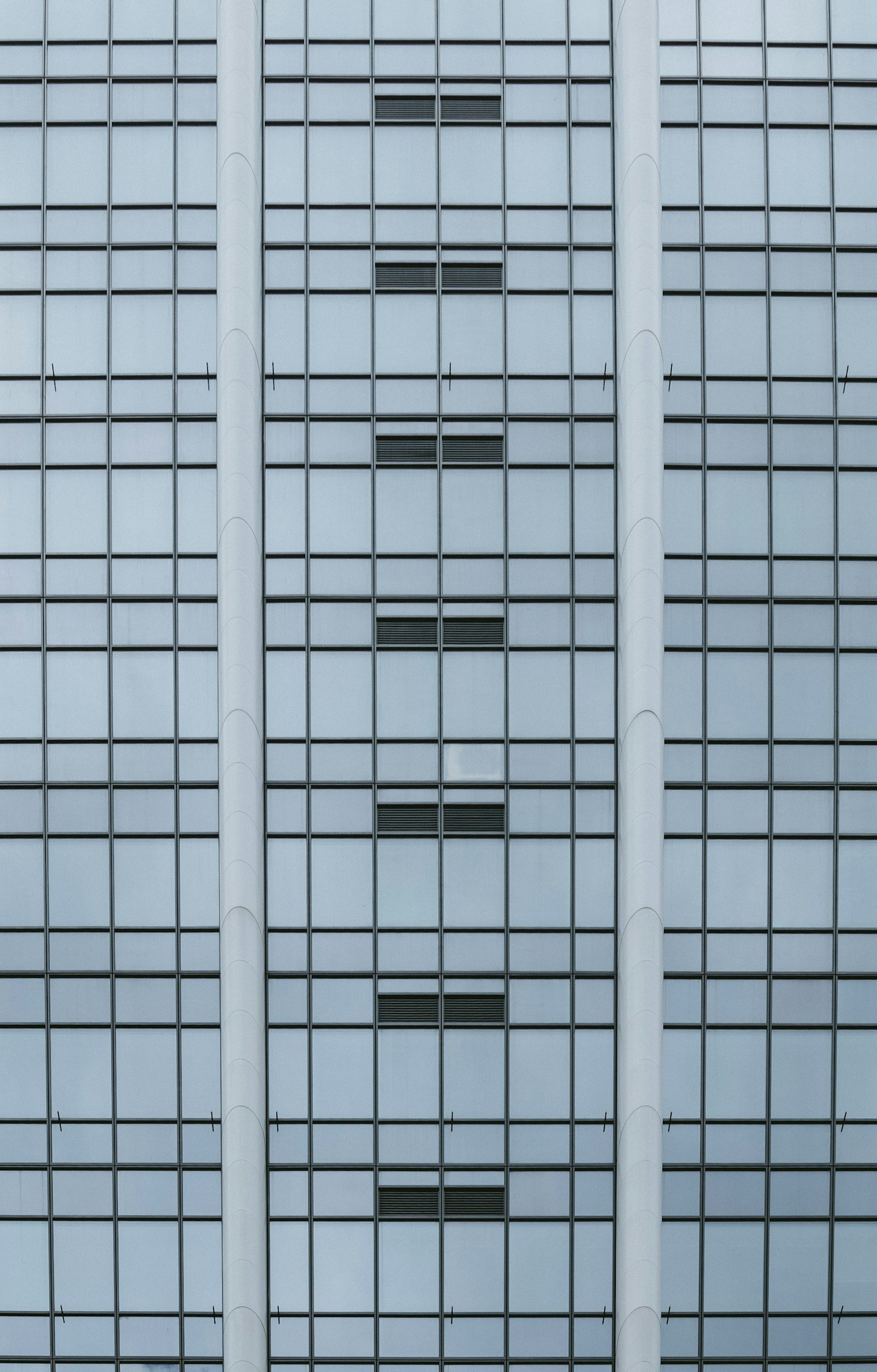 Modern commercial real estate building representing strategic property investment